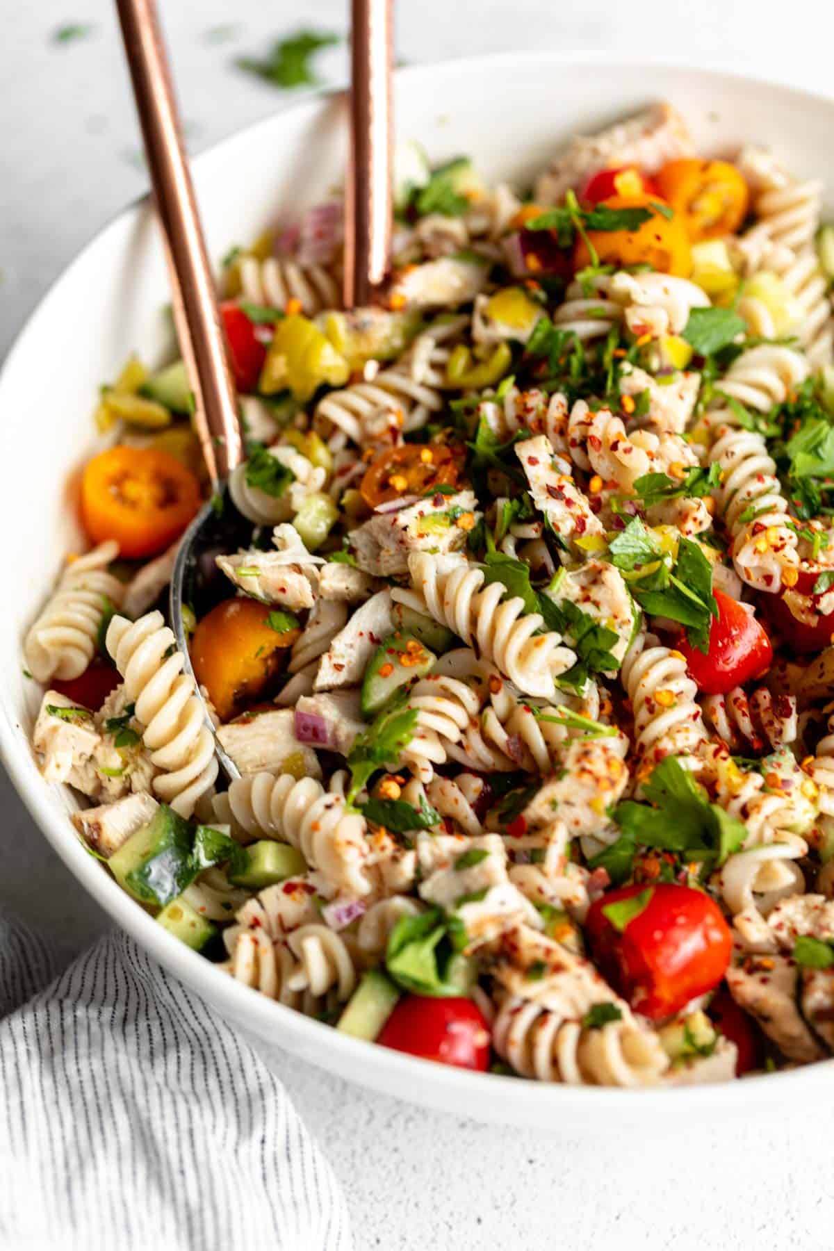 angled view of the gluten free pasta salad with veggies and chicken
