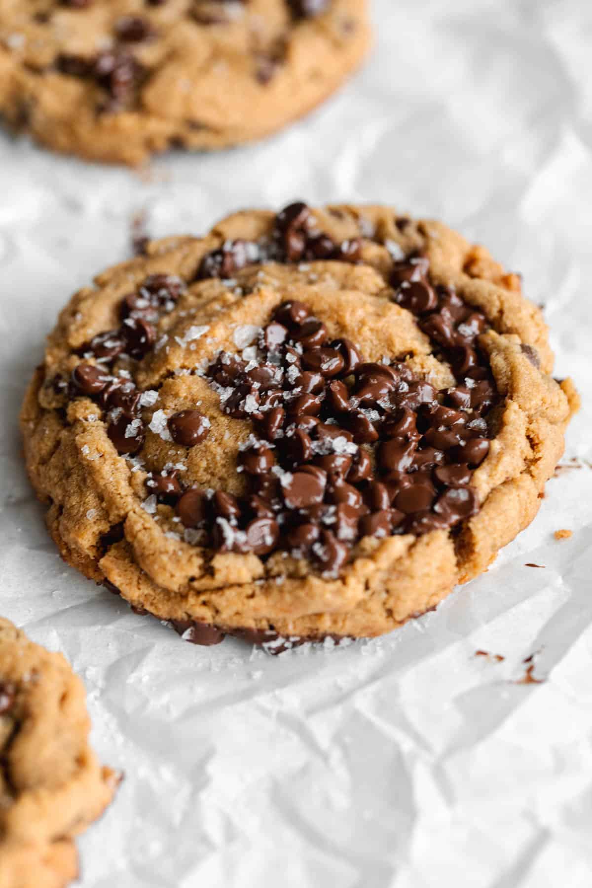 gluten free peanut butter chocolate chip cookies on parchment paper