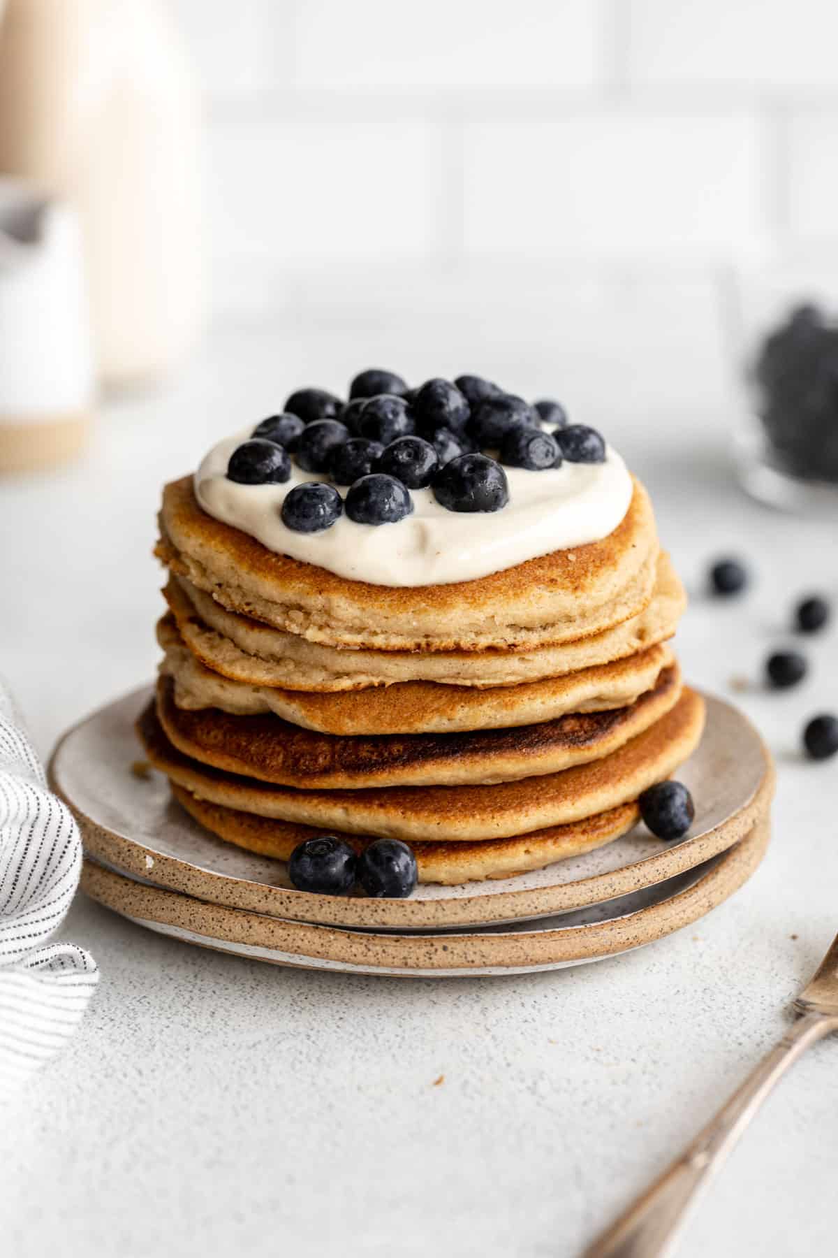 almond flour pancakes with berries on a plate
