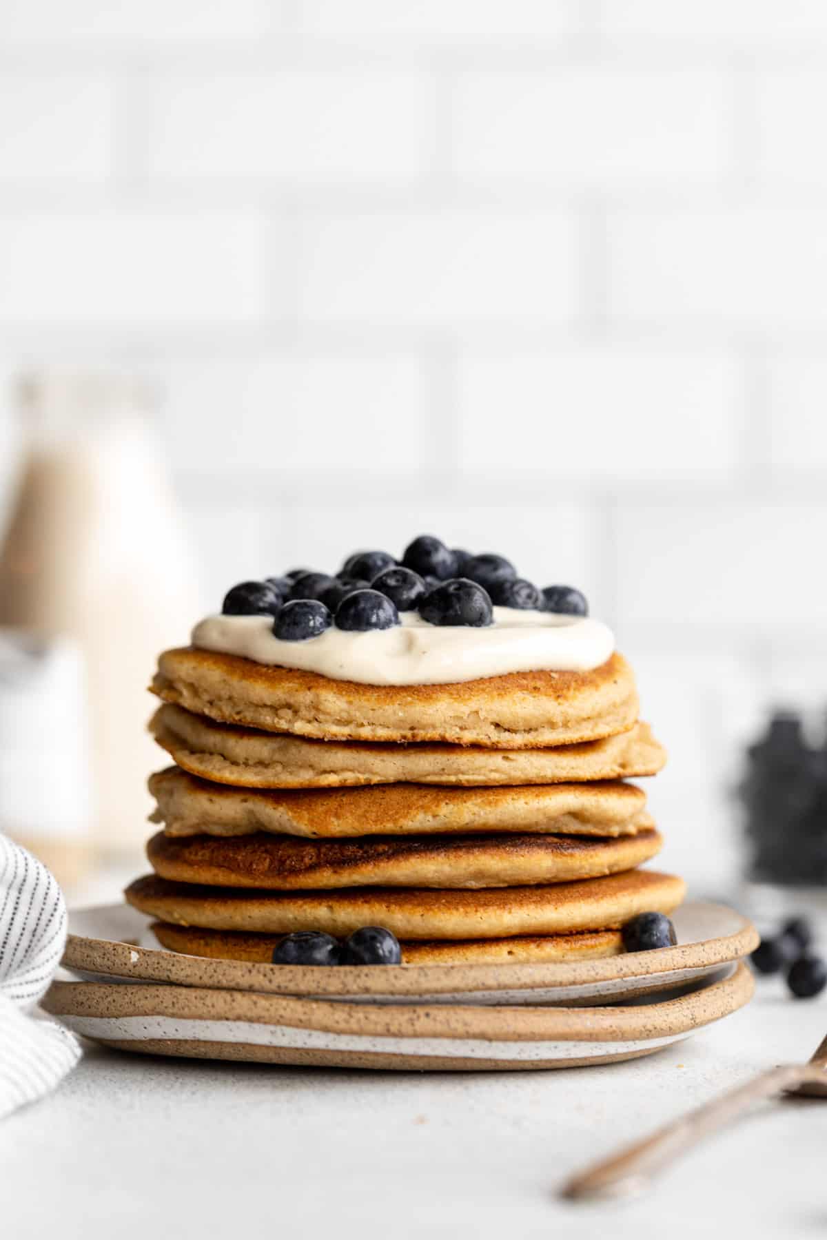 almond flour pancakes on a plate with berries