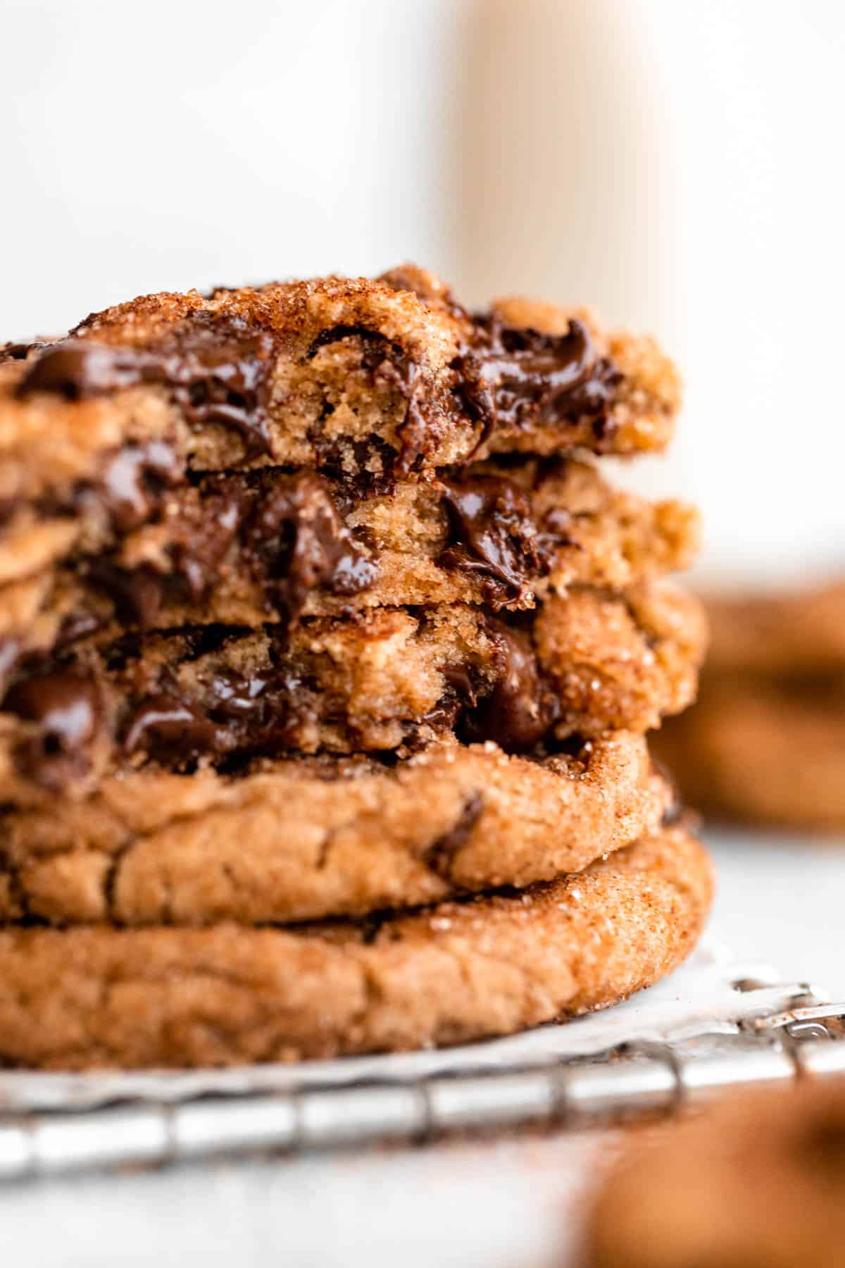 stack of the gluten free cookies with melted chocolate chips