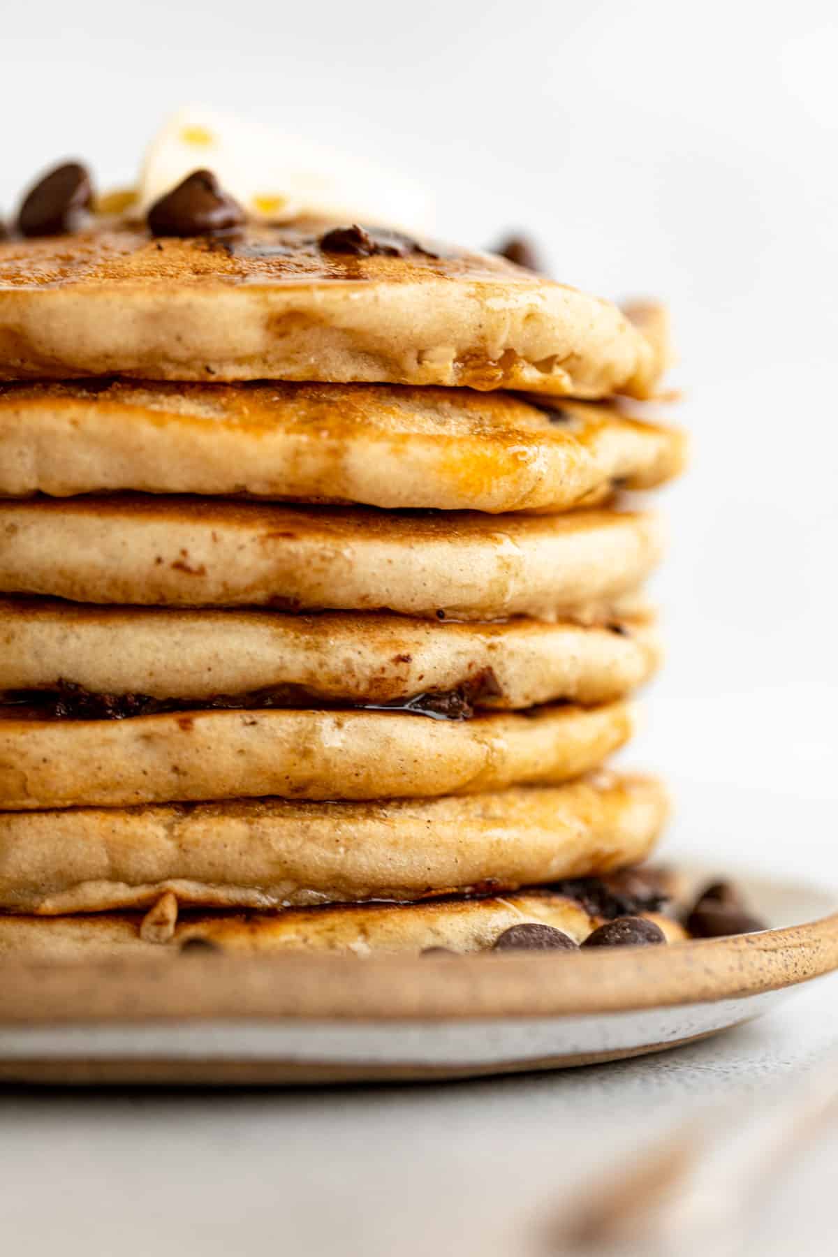 up close image of the stack of fluffy gluten free pancakes with chocolate chips