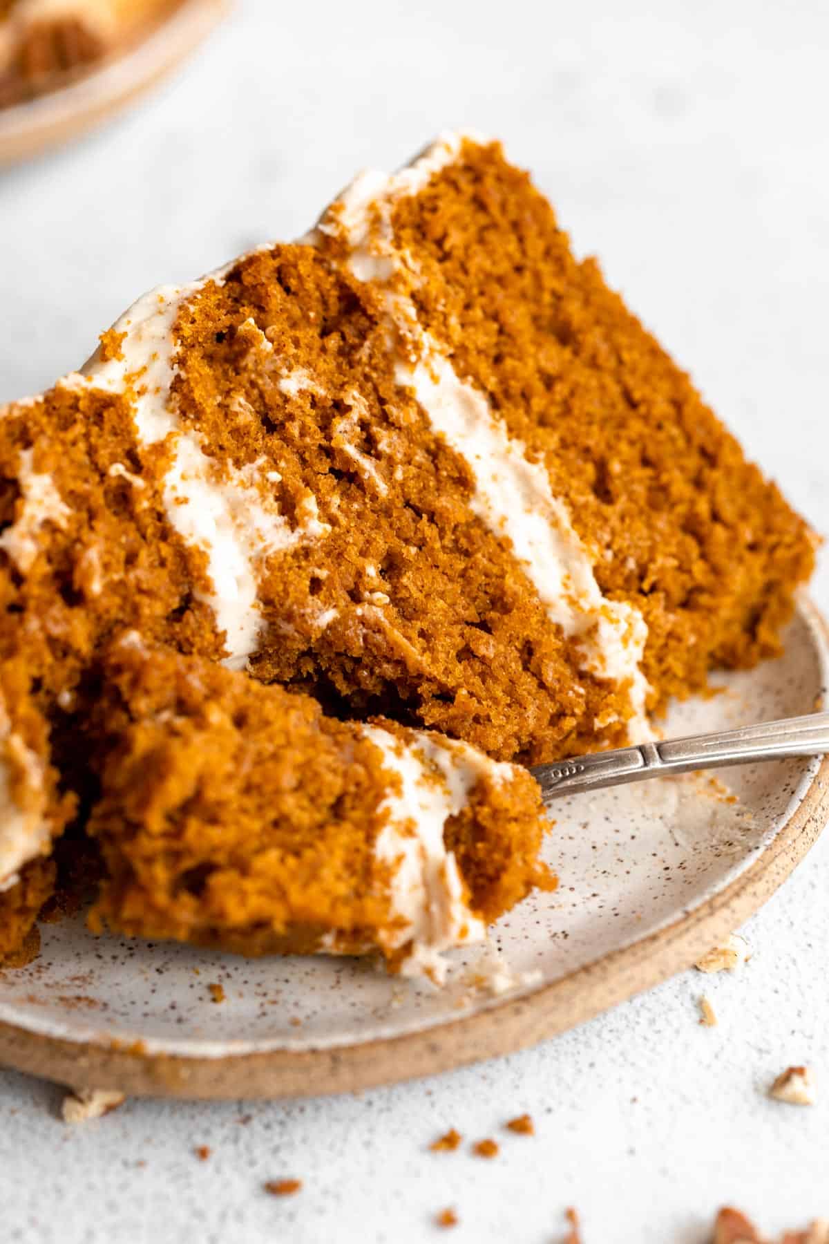 gluten free pumpkin cake on a plate with a fork
