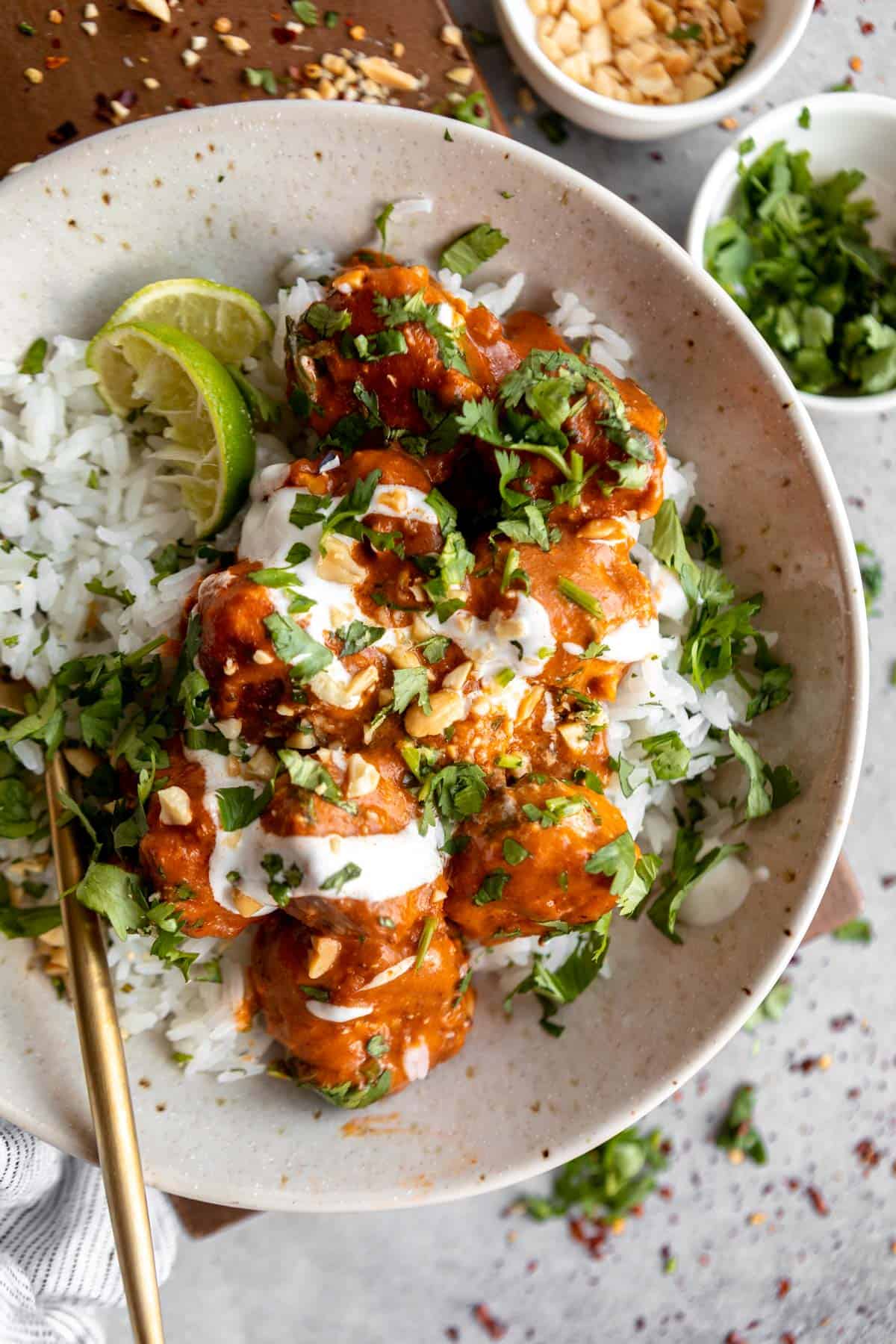 thai curry chicken meatballs with rice and lime