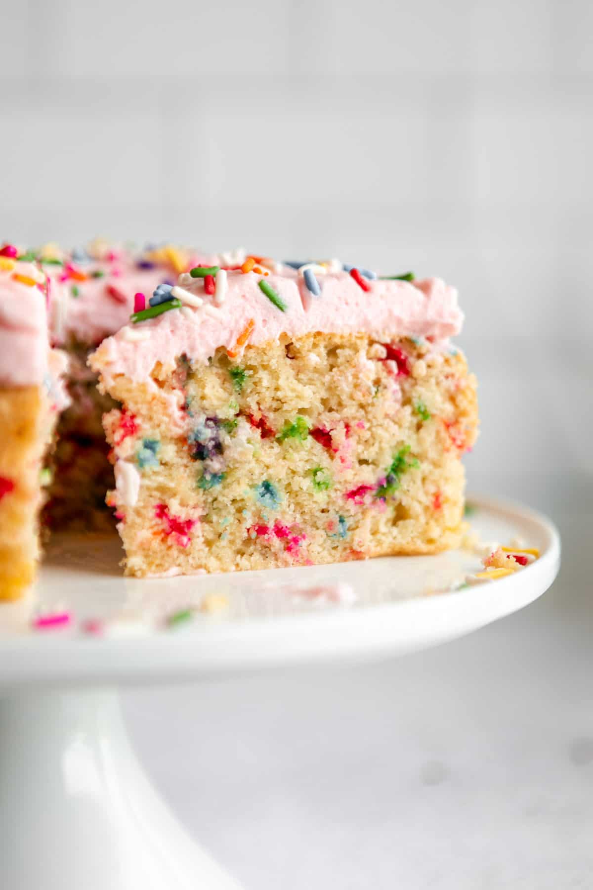 funfetti birthday cake with sprinkles and pink frosting