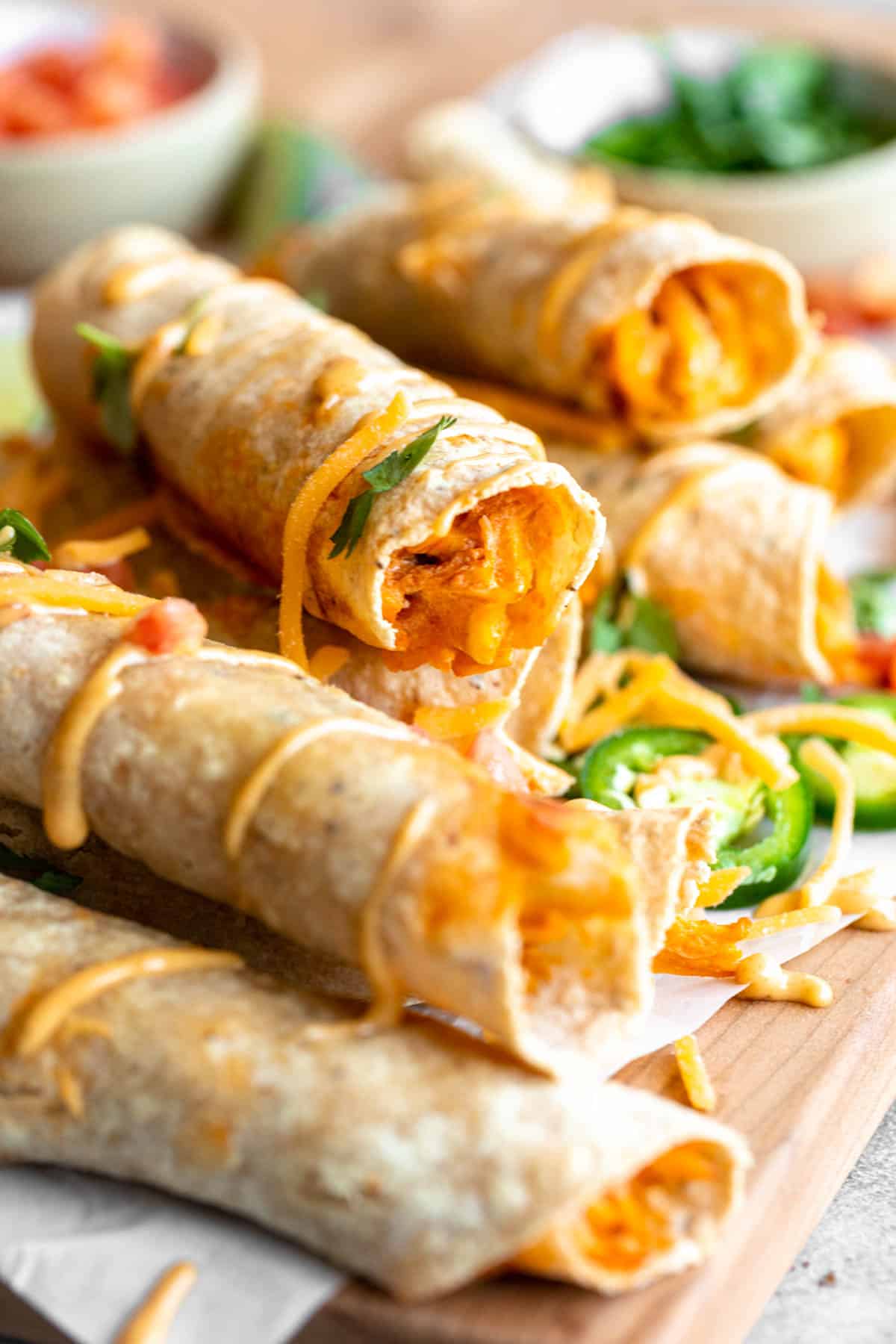 side view of the buffalo chicken taquitos with cheese