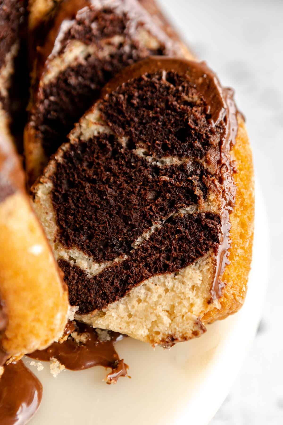 up close of the gluten free bundt cake with a slice cut out