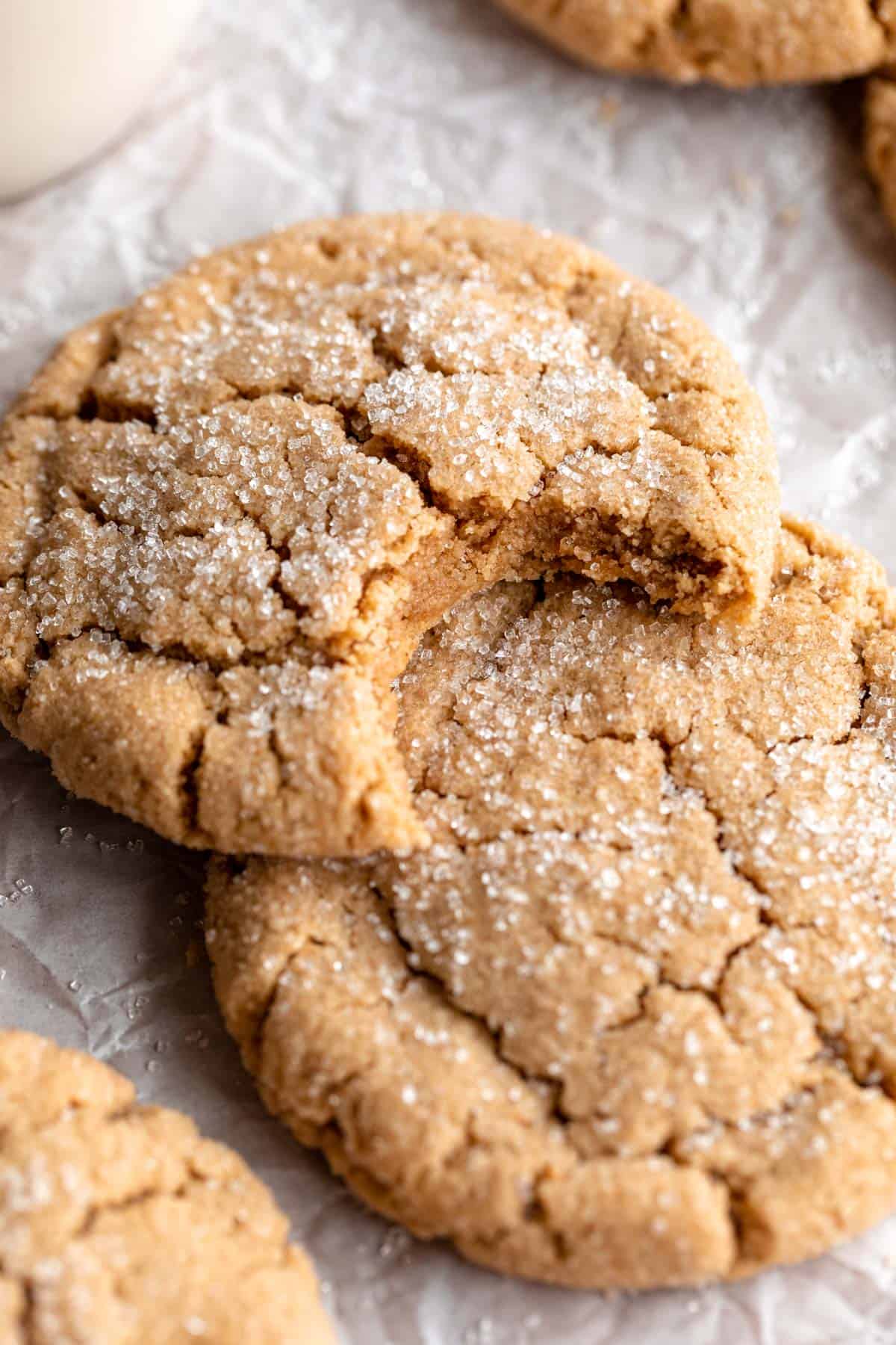 one vegan peanut butter cookie with sugar on top