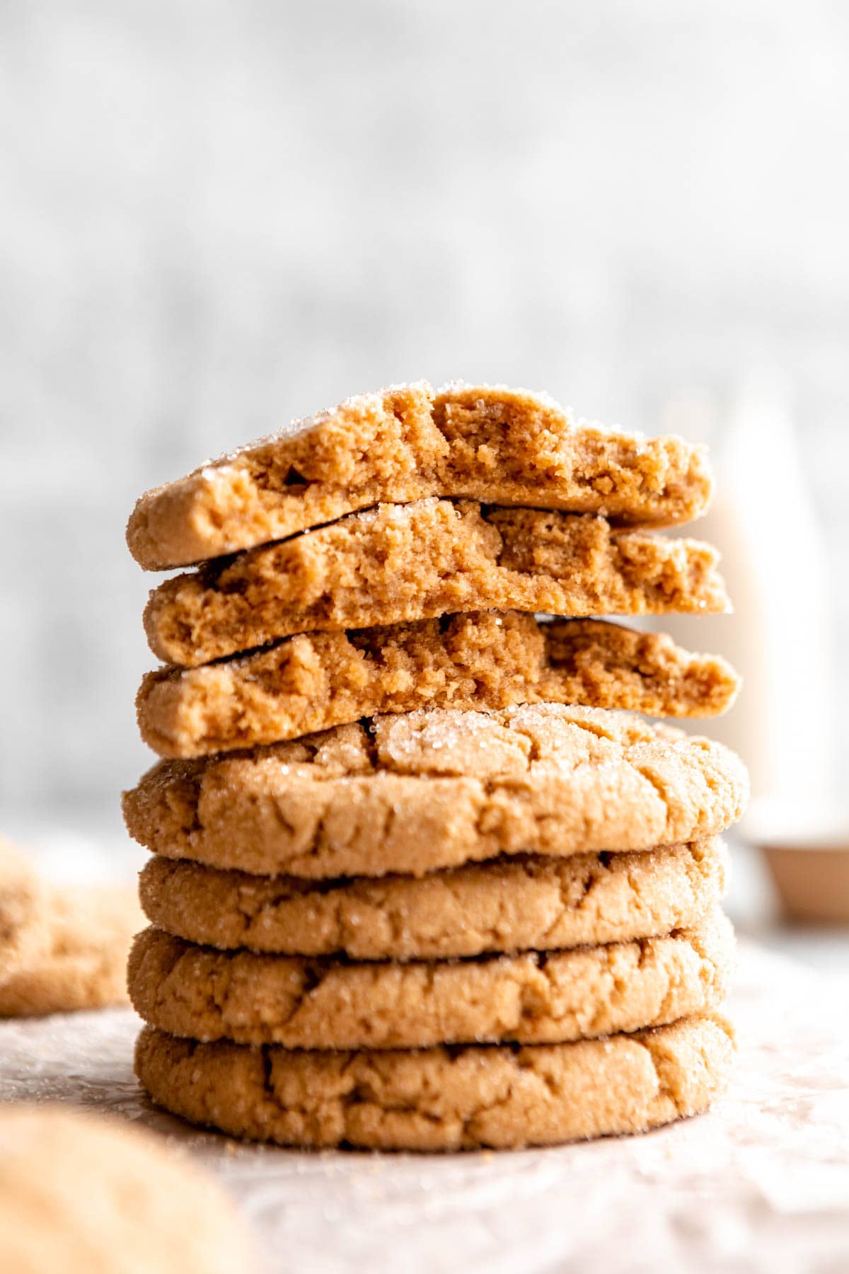 stack of vegan peanut butter cookies on parchment paper