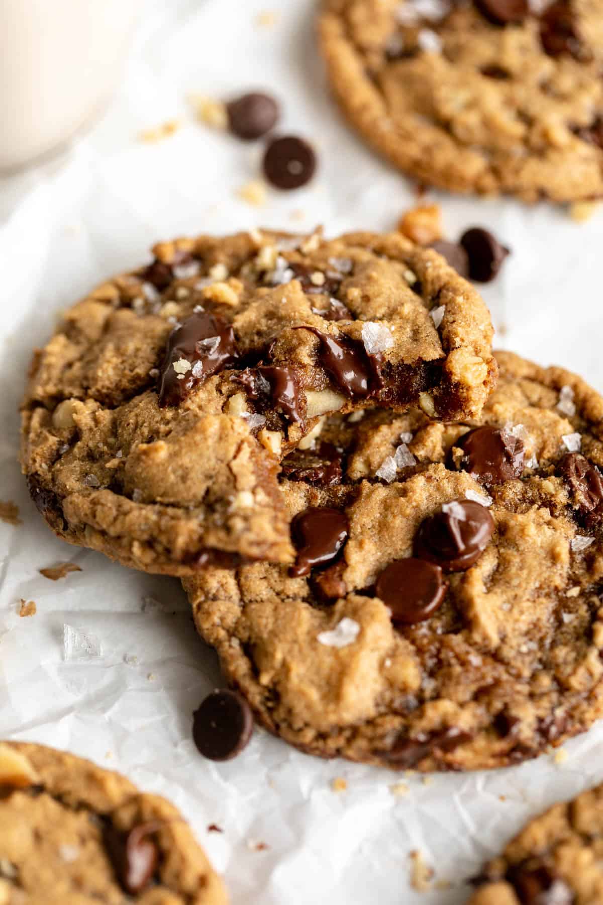banana bread cookies on parchment paper with chocolate chips