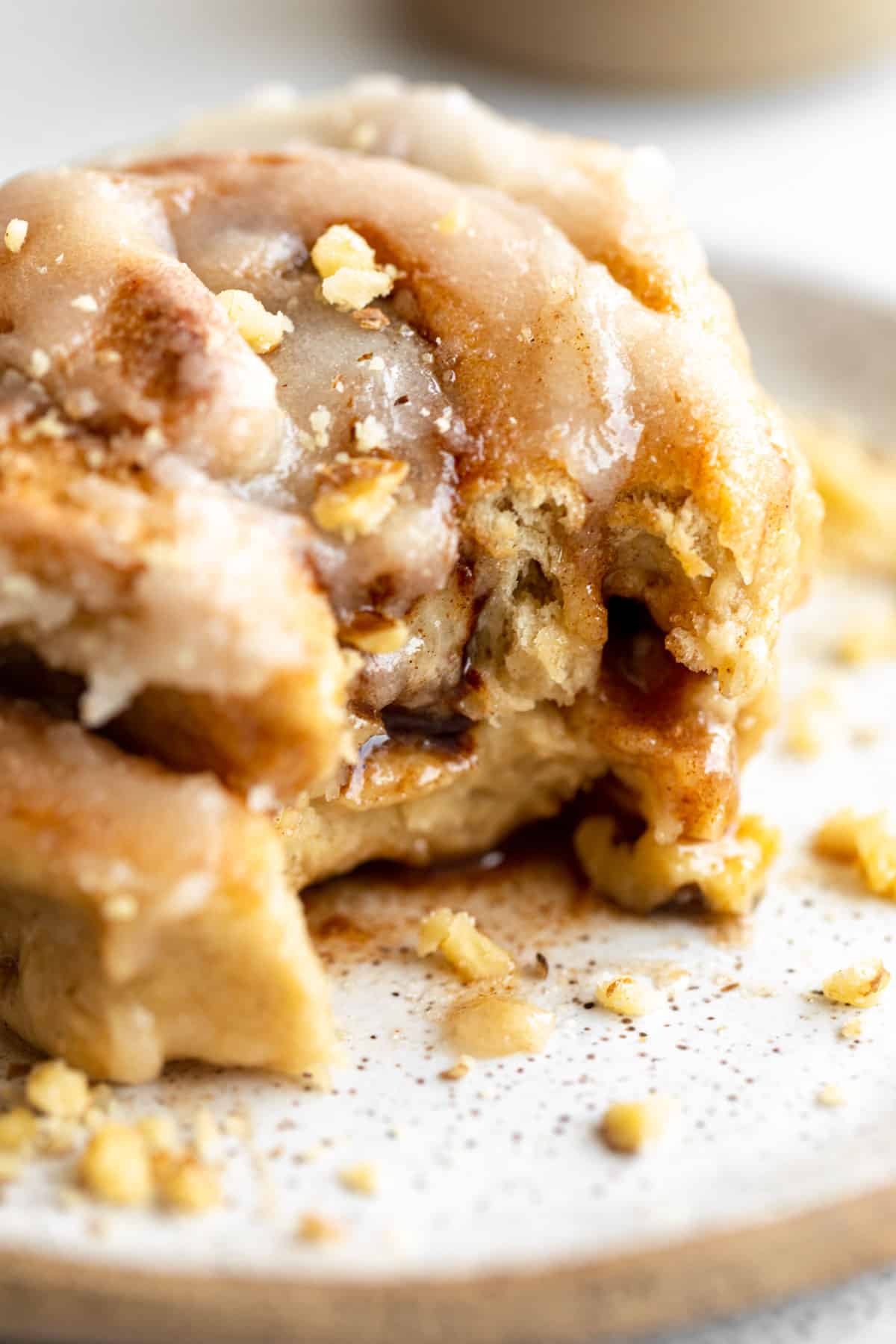 gluten free banana bread cinnamon roll with a bite taken out