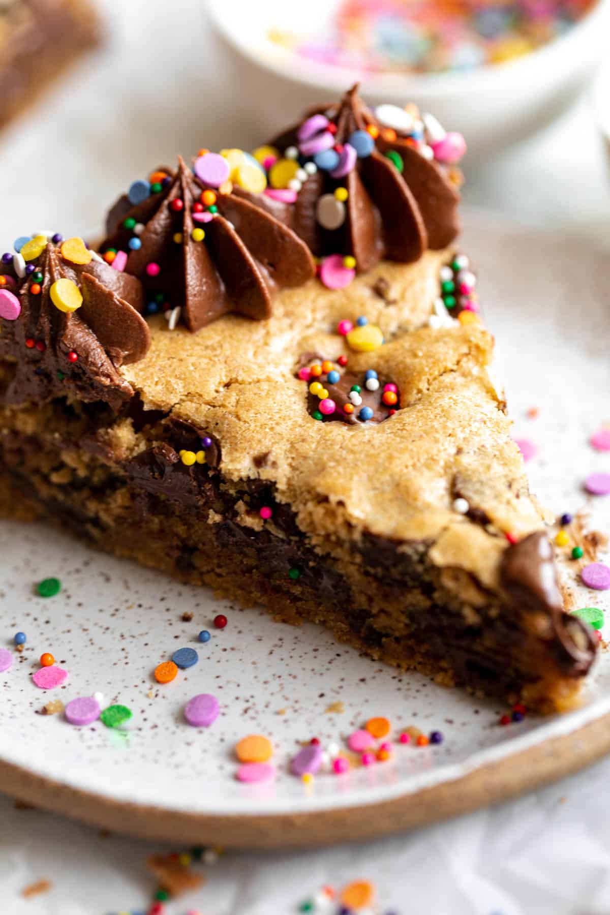 slice of the gluten free cookie cake with sprinkles on top