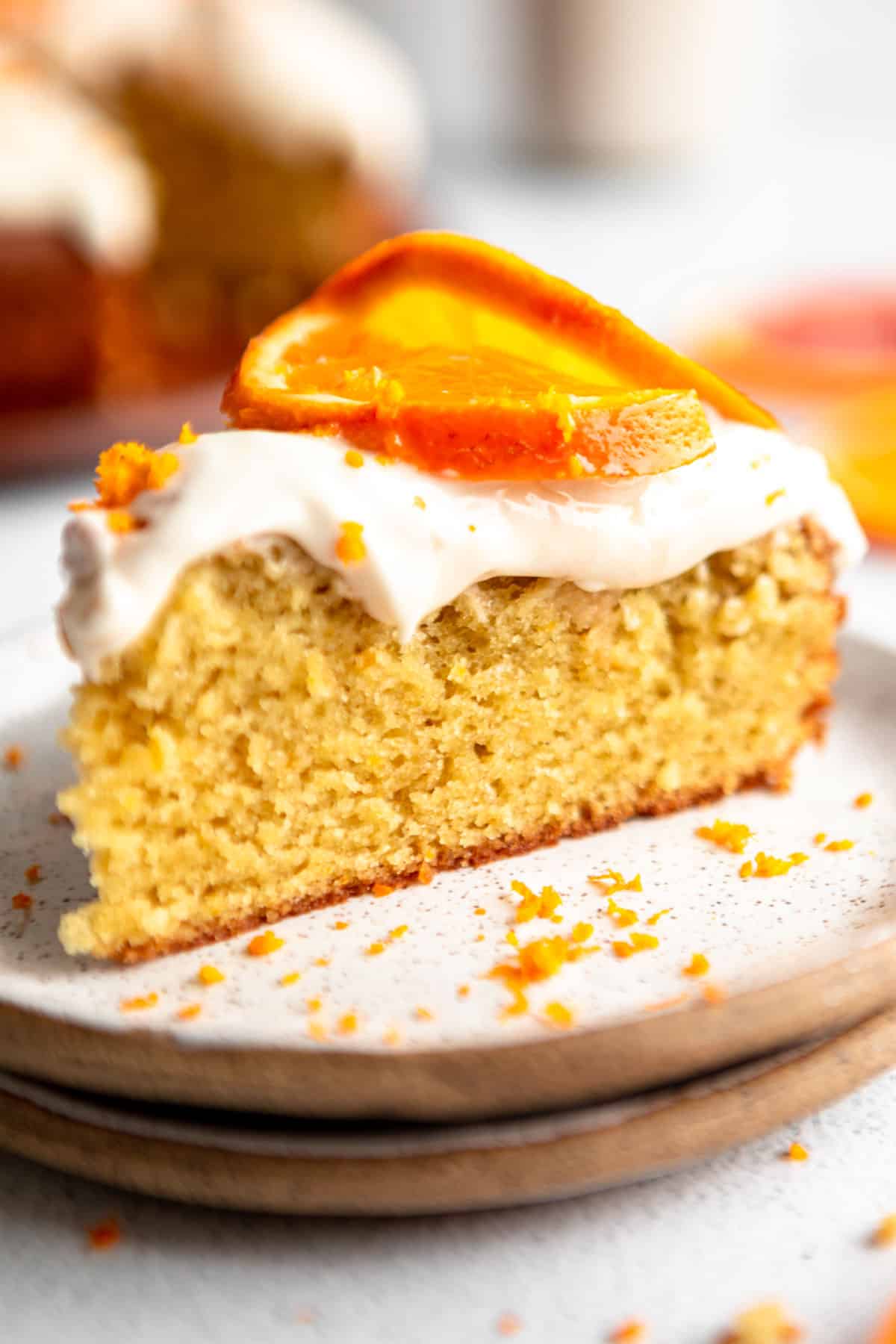 slice of gluten free orange olive oil cake on a plate