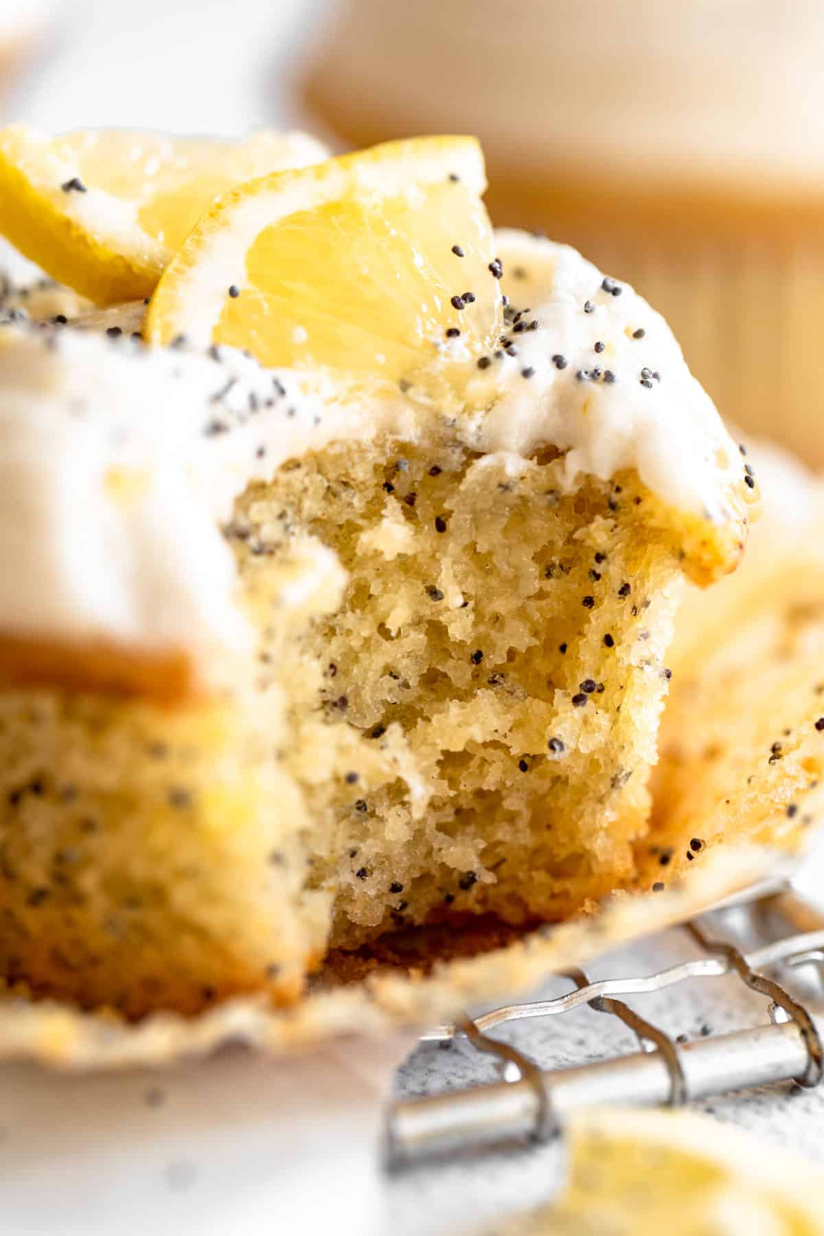 gluten free lemon cupcakes with a bite taken out