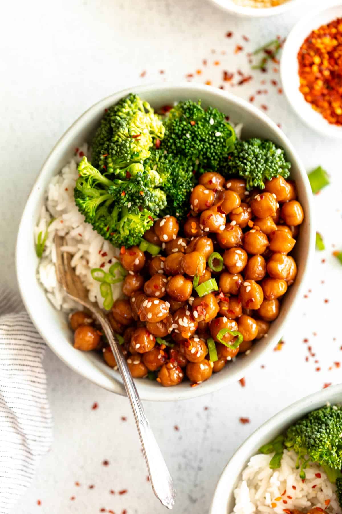 vegan sesame chickpea recipe in a bowl with broccoli