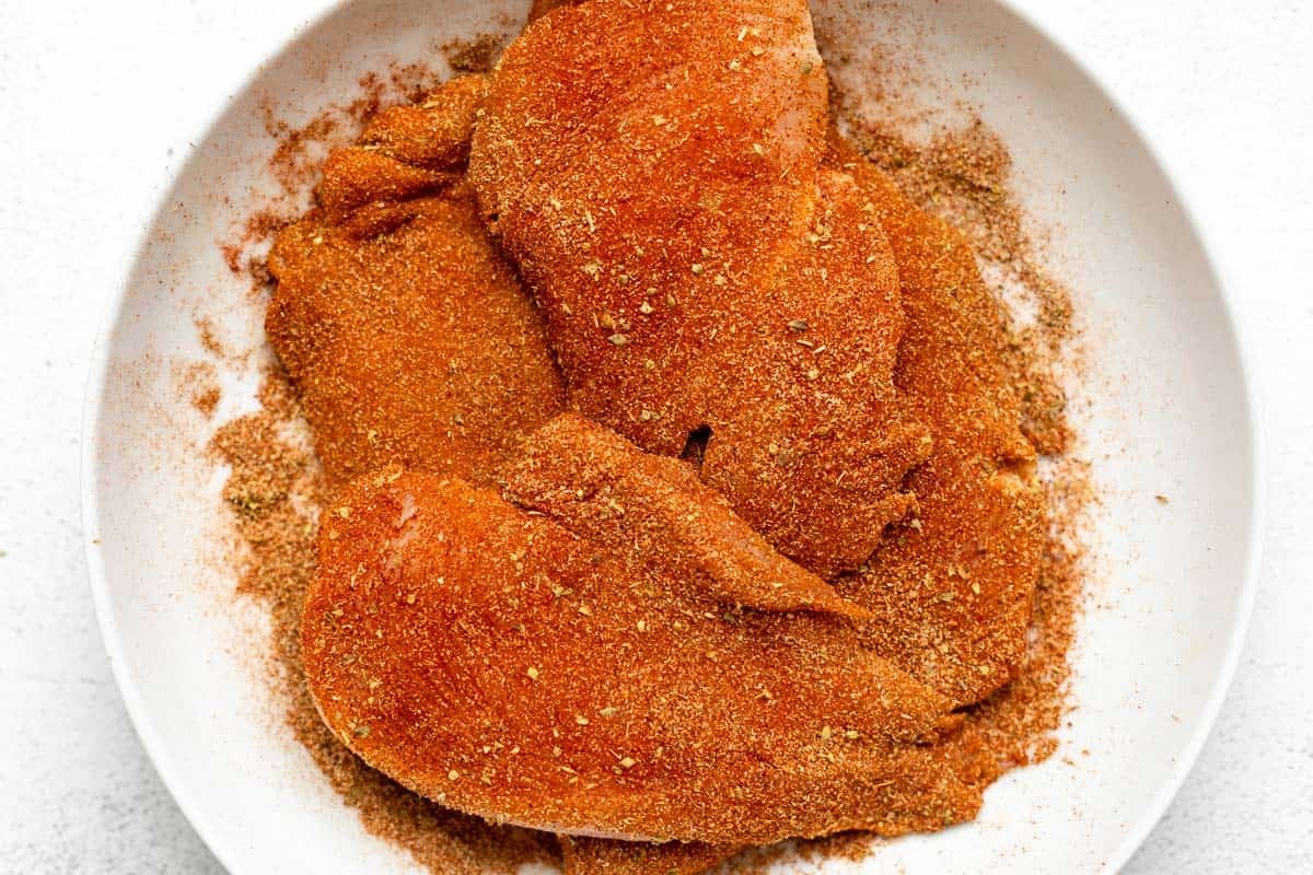 seasoned meat in a white bowl