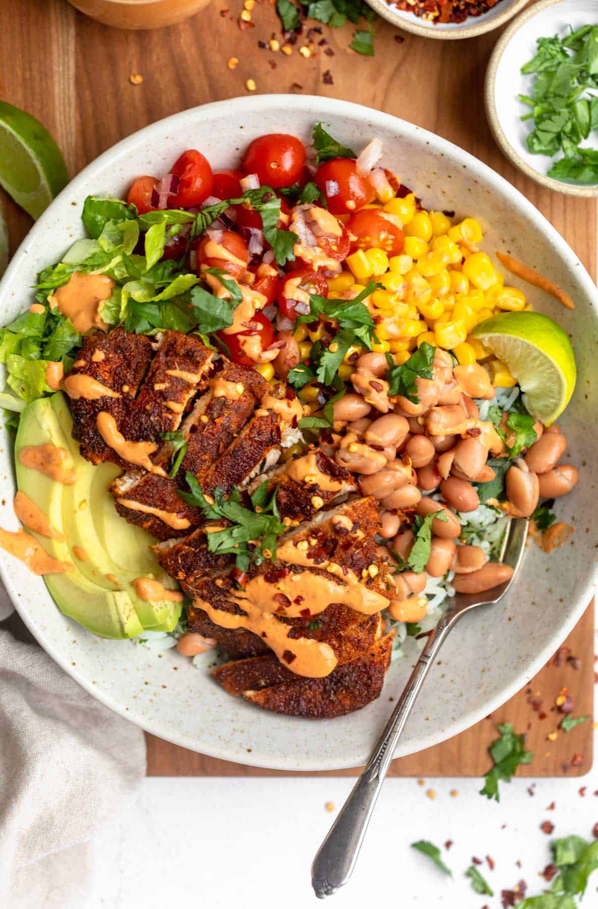 overhead view of the chicken burrito bowl with rice and veggies