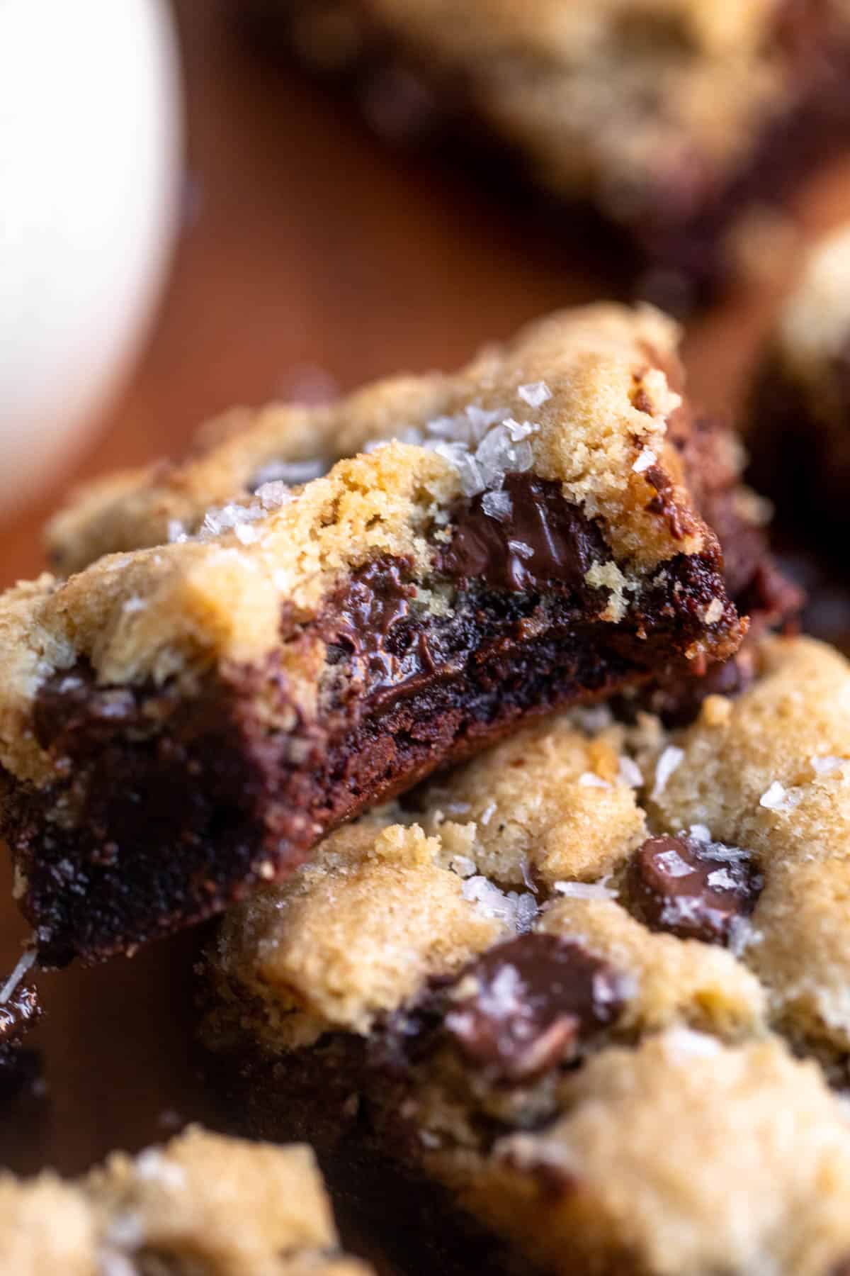 bite taken out of the gluten free brookie with melted chocolate