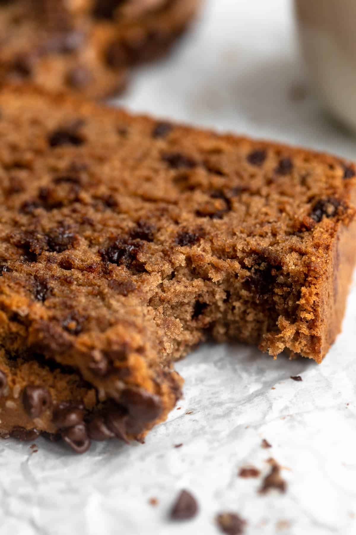 peanut butter banana bread with a bite taken out to show texture