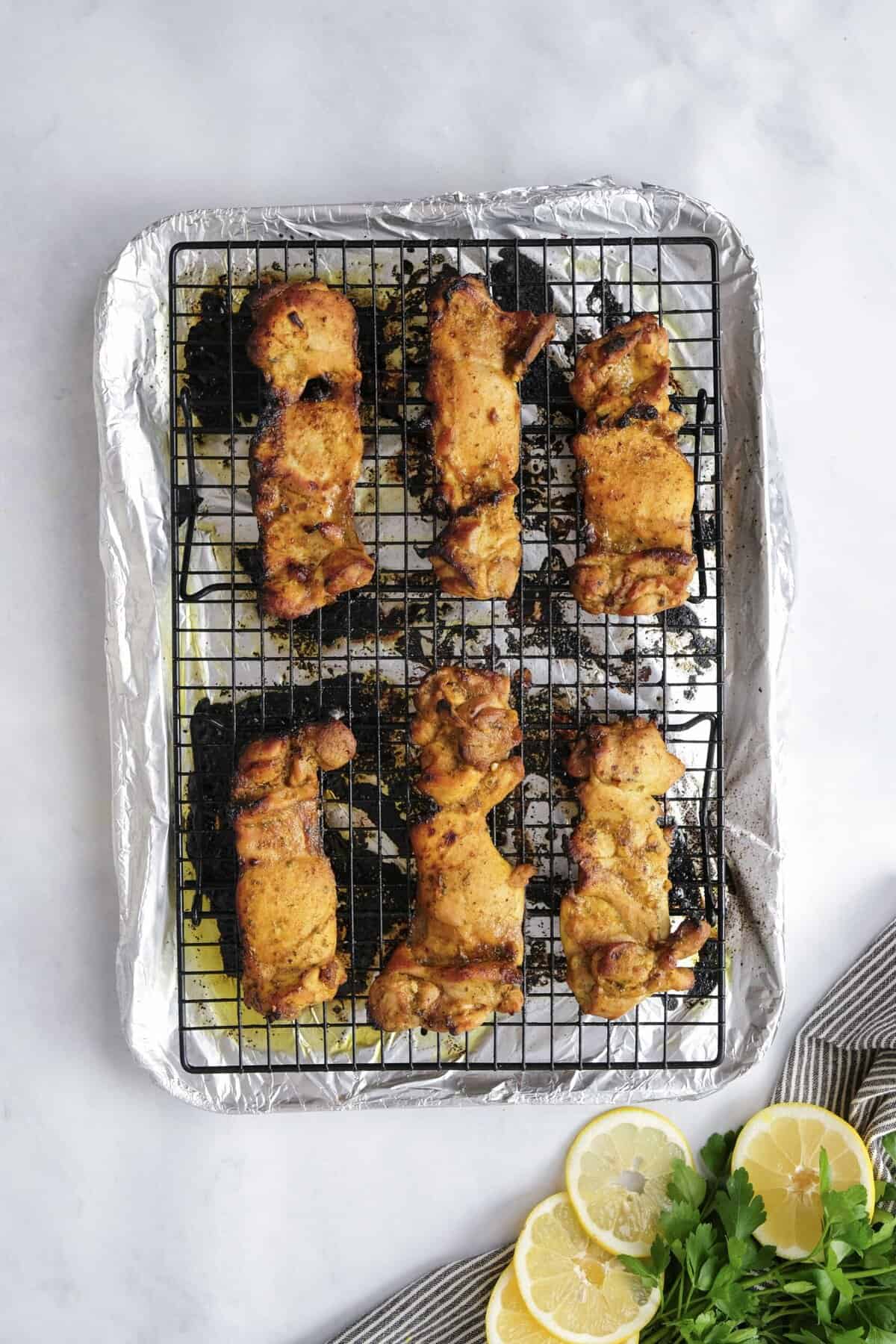 chicken on a wire rack after cooking