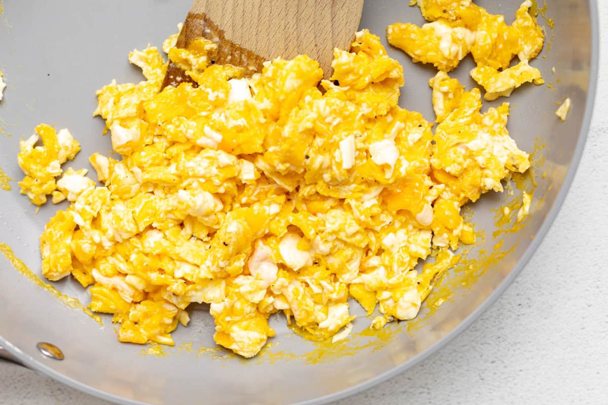 eggs scrambled in a pan