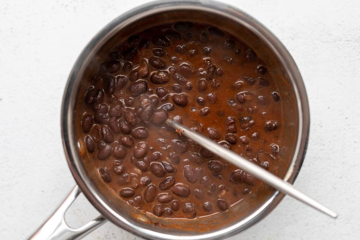 black beans simmering in a pot