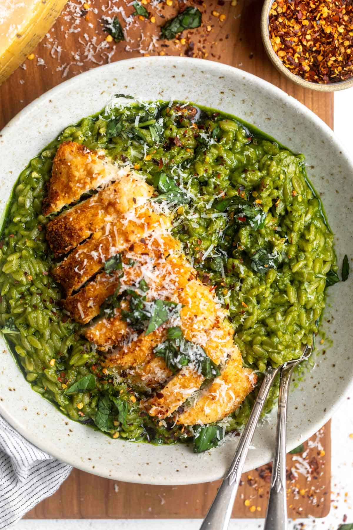 overhead shot of the gluten free pesto orzo with chicken on top