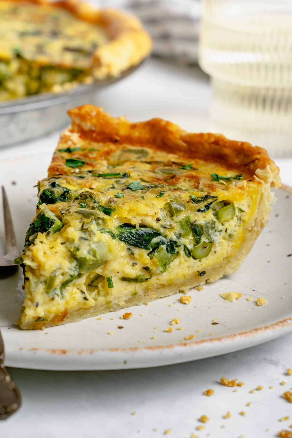 slice of gluten free quiche on a plate to show texture