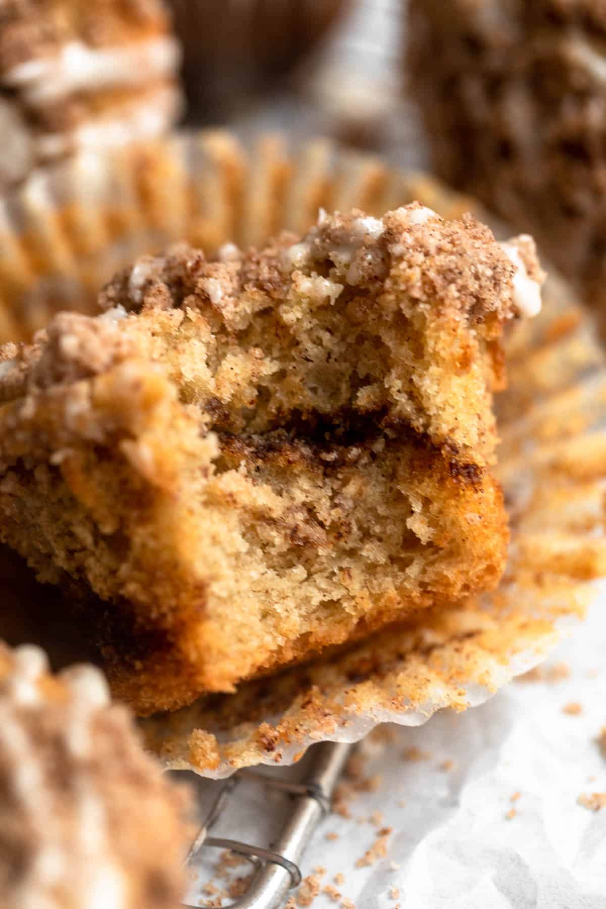 bite taken out of the gluten free coffee cake muffin to show swirl