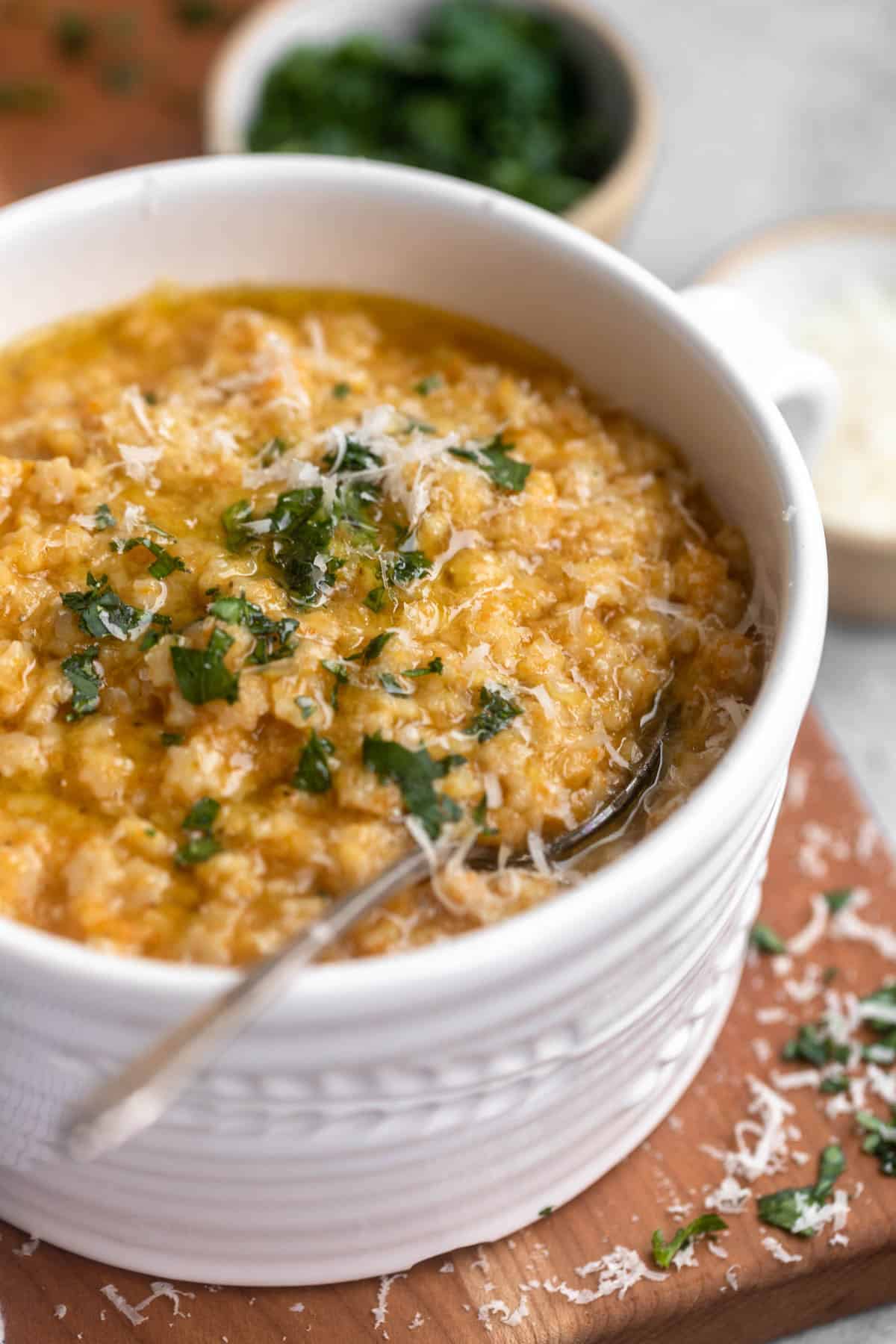 angled view of the gluten free pastina with parsley and parmesan on top