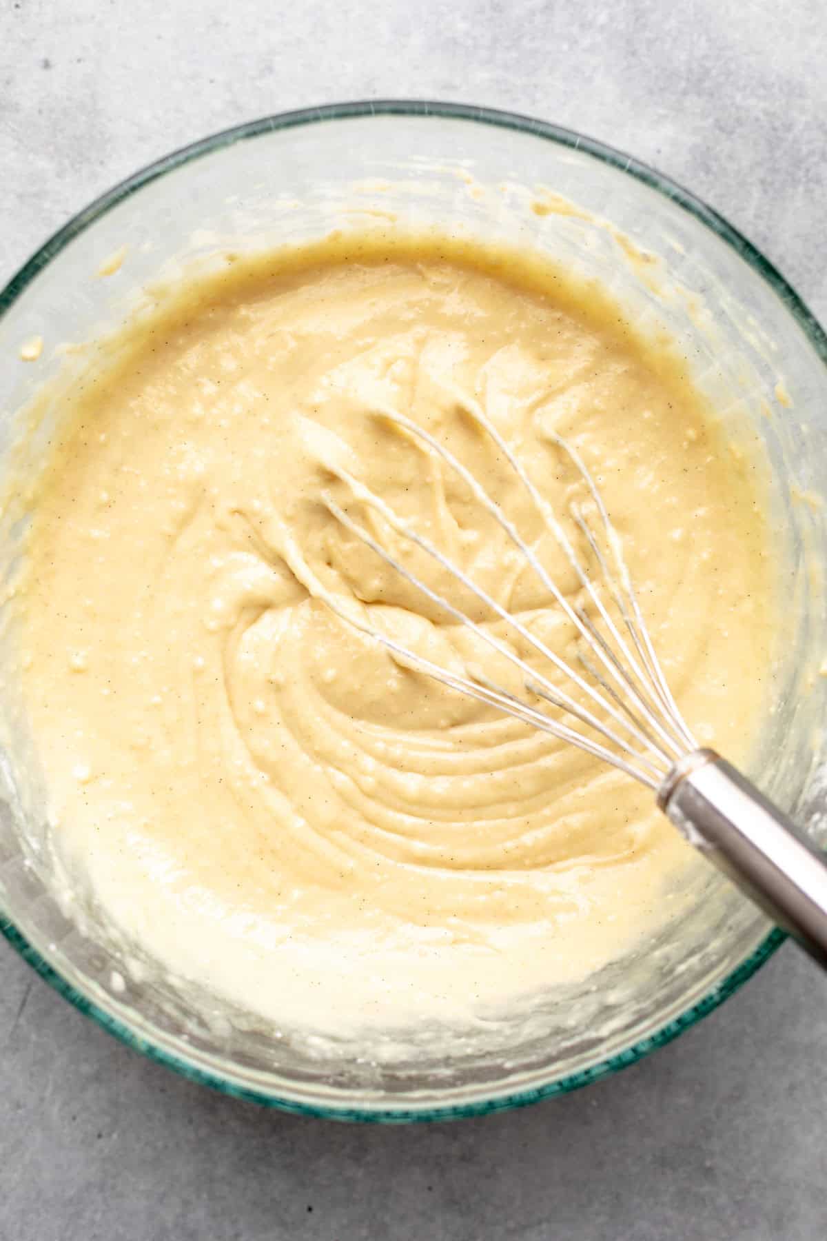 batter in a bowl with a whisk