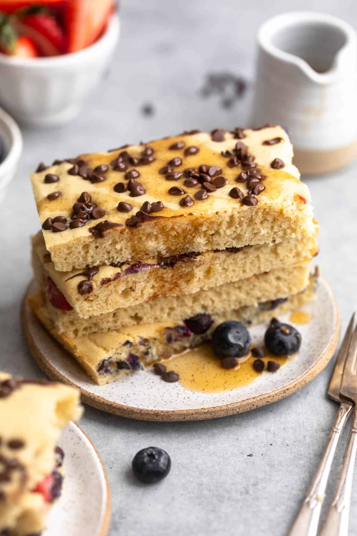 stack of gluten free sheet pan pancakes to show fluffy texture