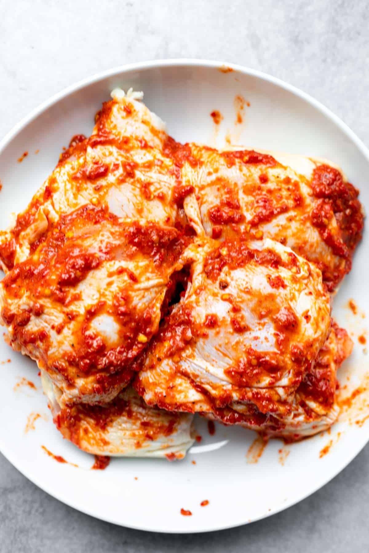 chicken marinating in the sauce