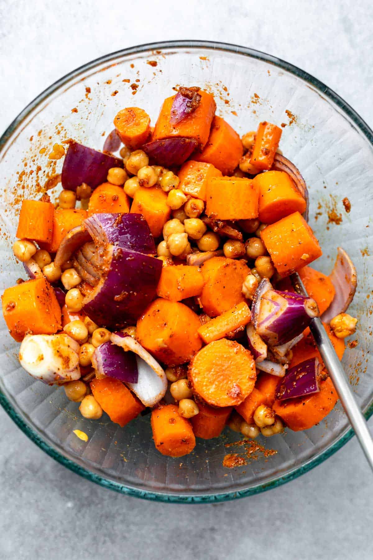 veggies and sauce mixed in a bowl