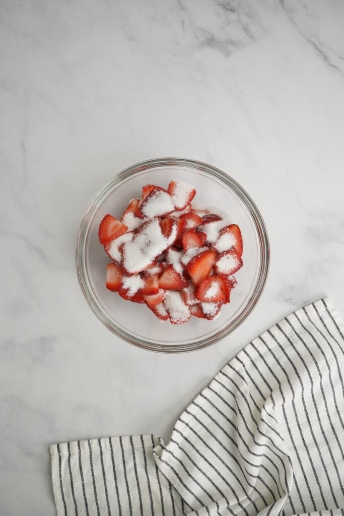 strawberries in a bowl with sugar