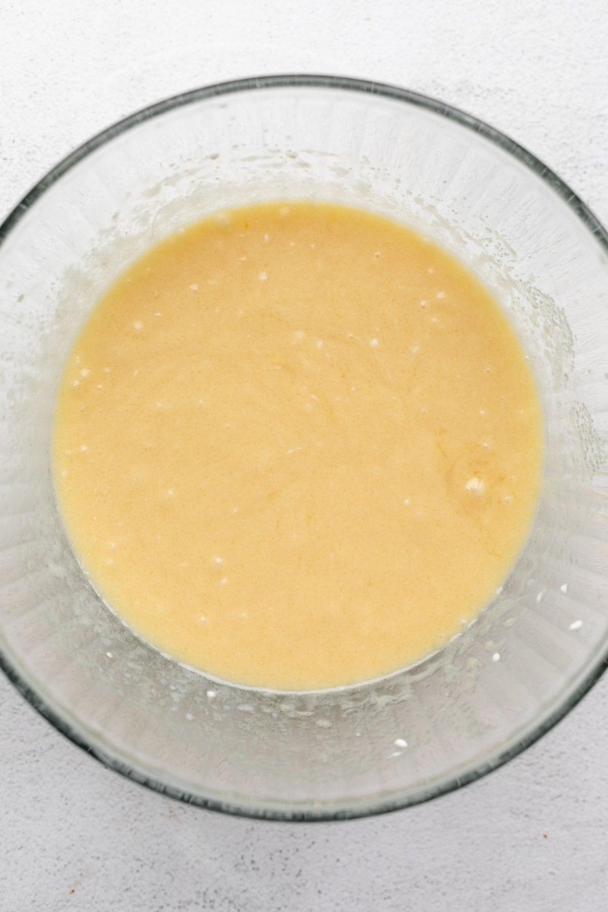 wet ingredients whisked in a bowl