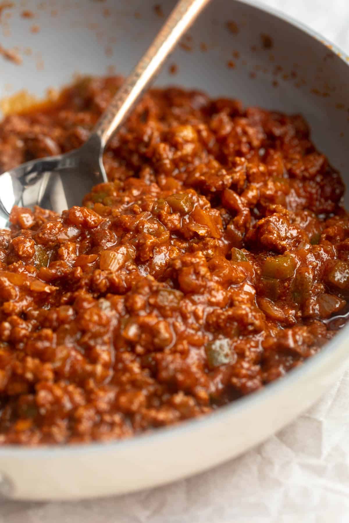 sloppy joe filling in a skillet simmering
