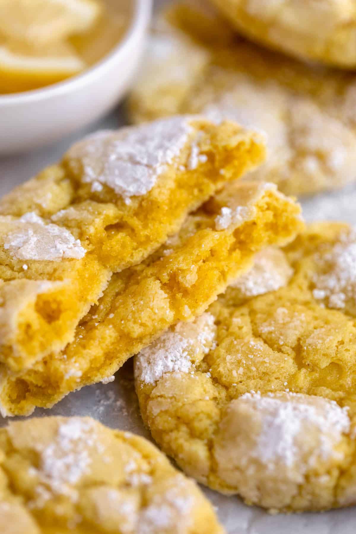 lemon crinkle cookie ripped in half to show texture