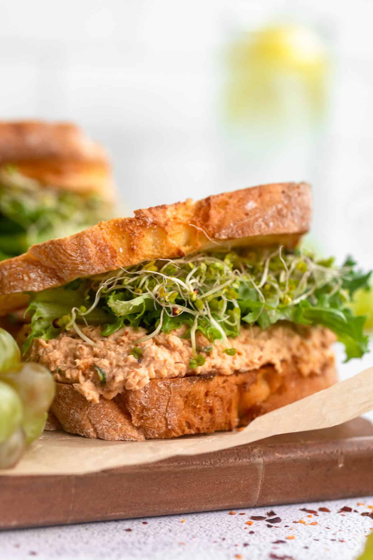 spicy salmon salad sandwich with toasted bread and lettuce
