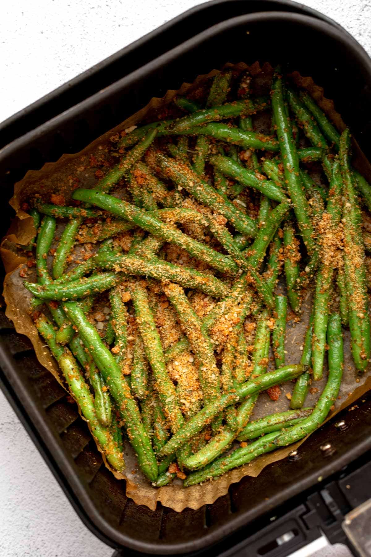 adding the parmesan breadcrumbs on top