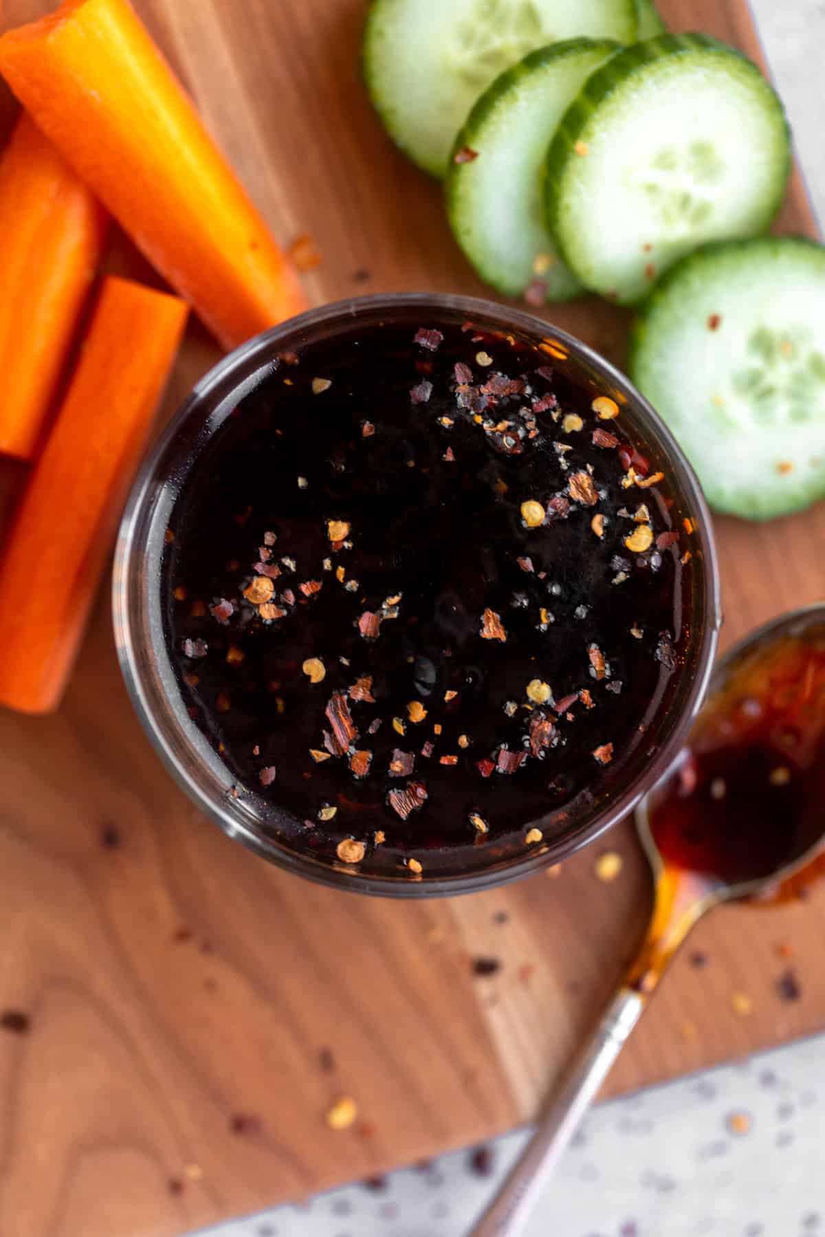 gluten free teriyaki sauce in a jar with veggies on the side