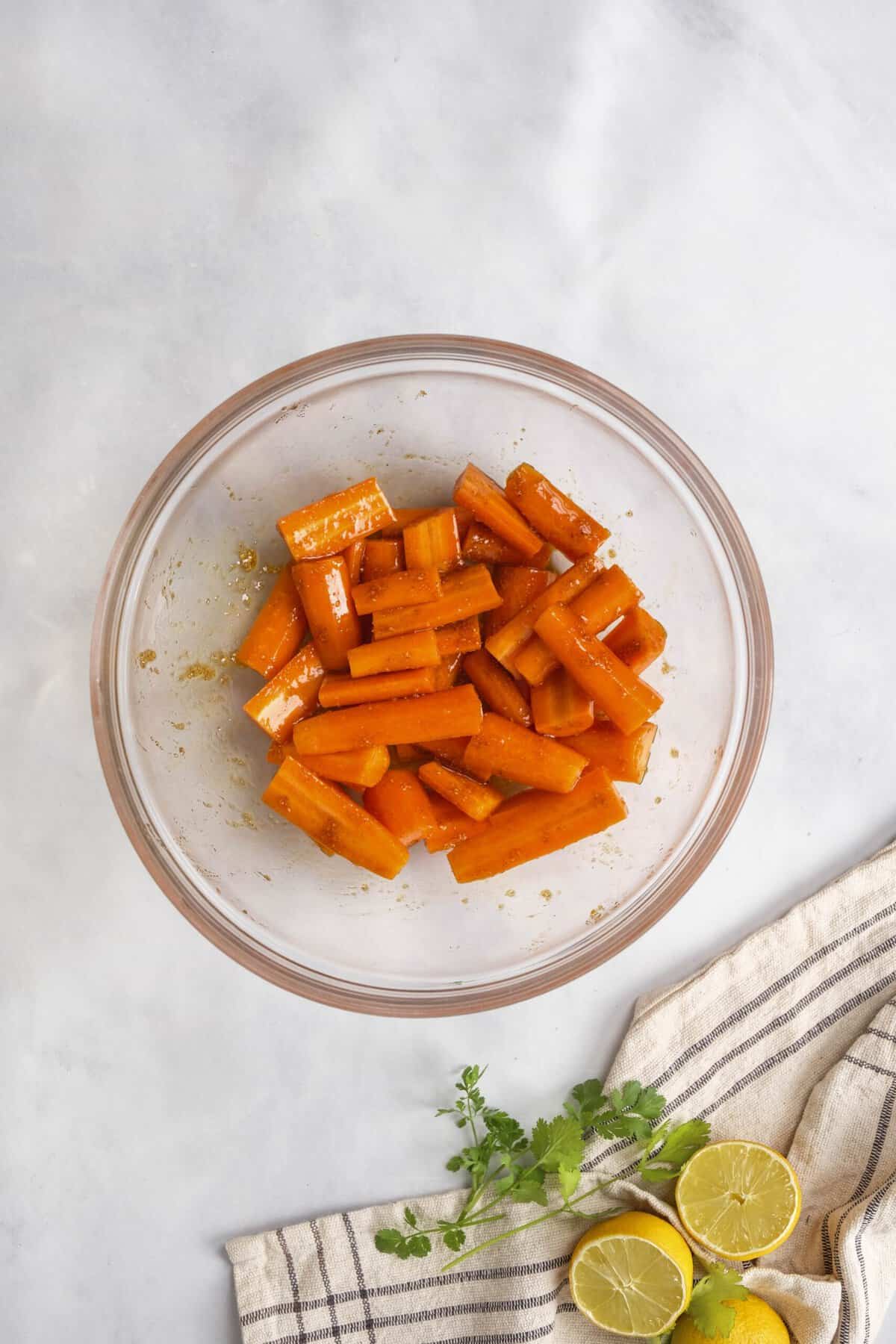 carrots marinating in a bowl
