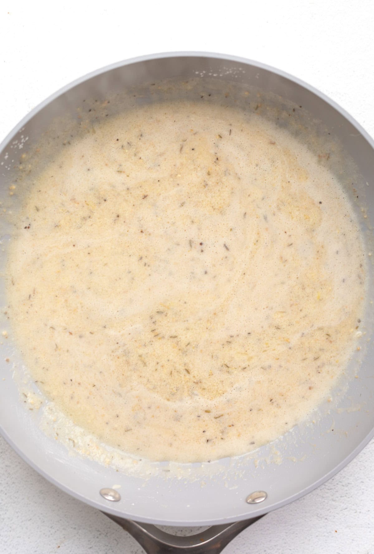 sauce simmering in a skillet