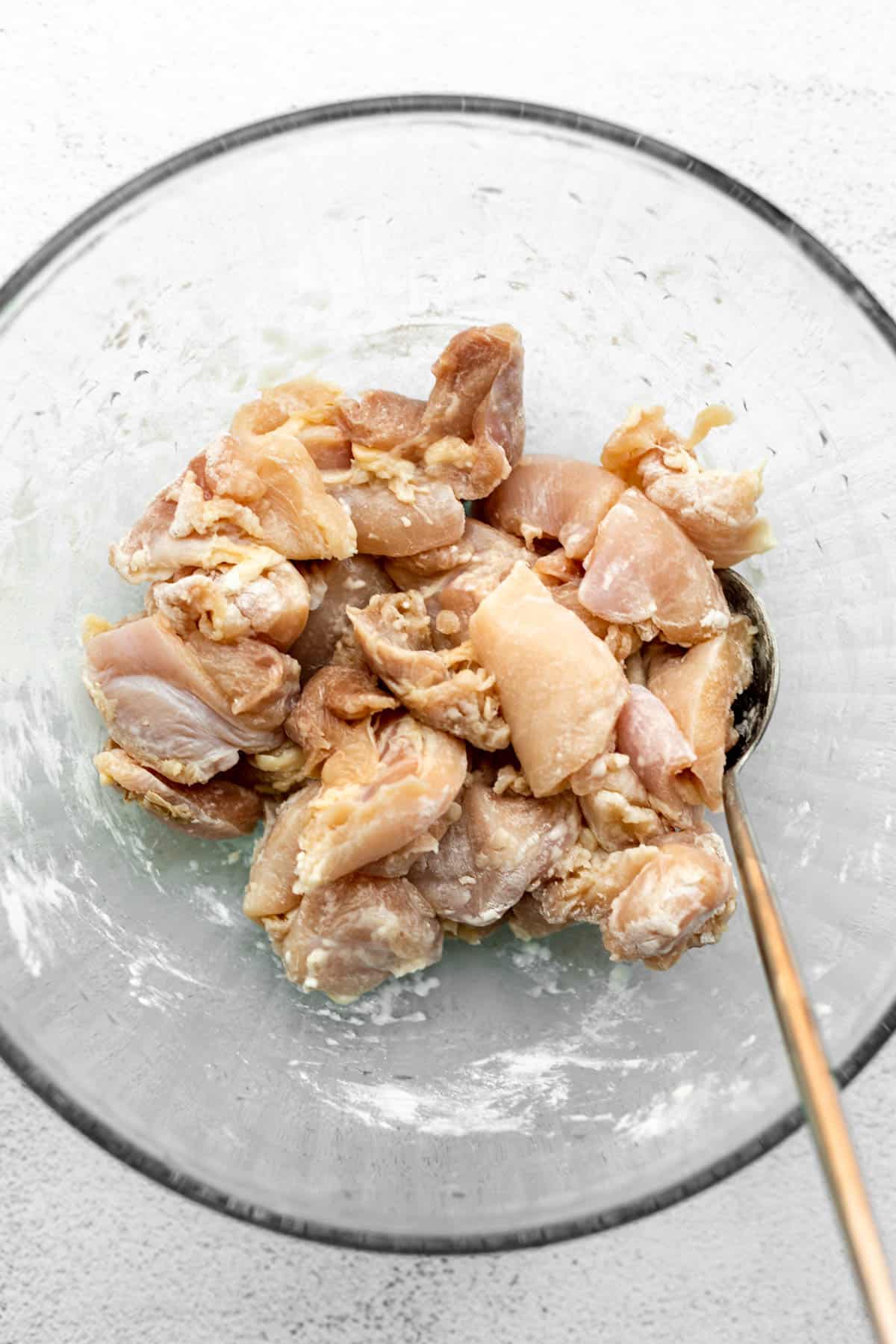 cut meat in a bowl with cornstarch