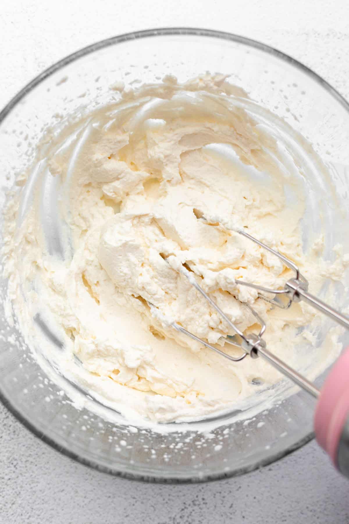 whipped cream in a glass bowl 