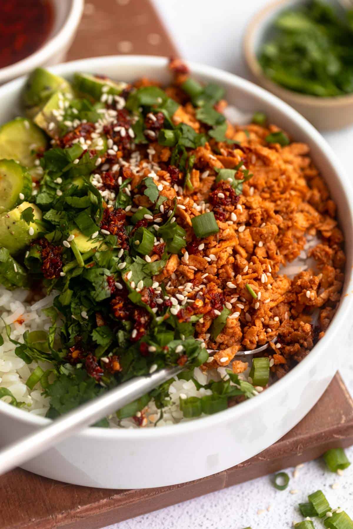 asian tofu crumble bowl with veggies on the side