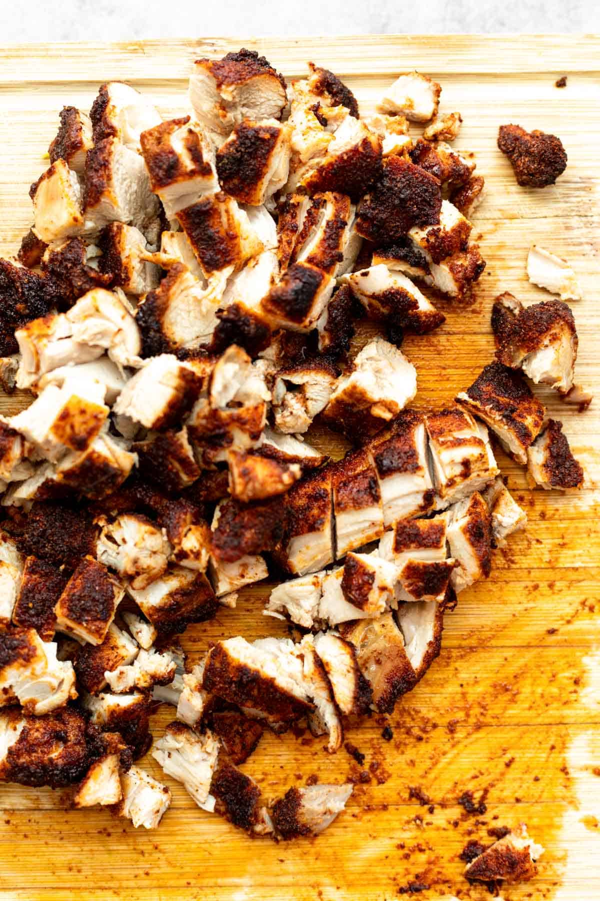 meat chopped up on a cutting board