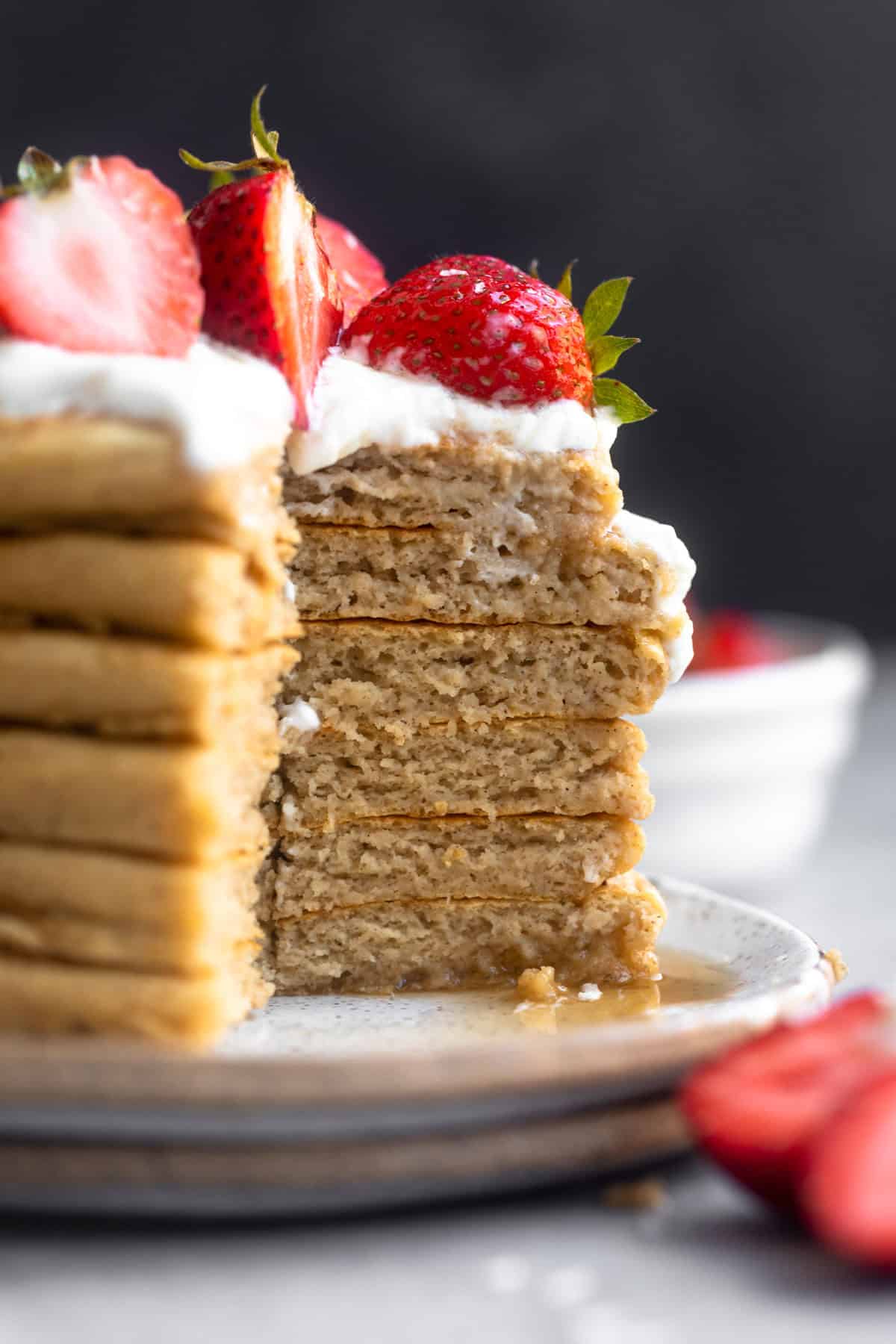 gluten free protein pancakes cut open to show fluffy texture
