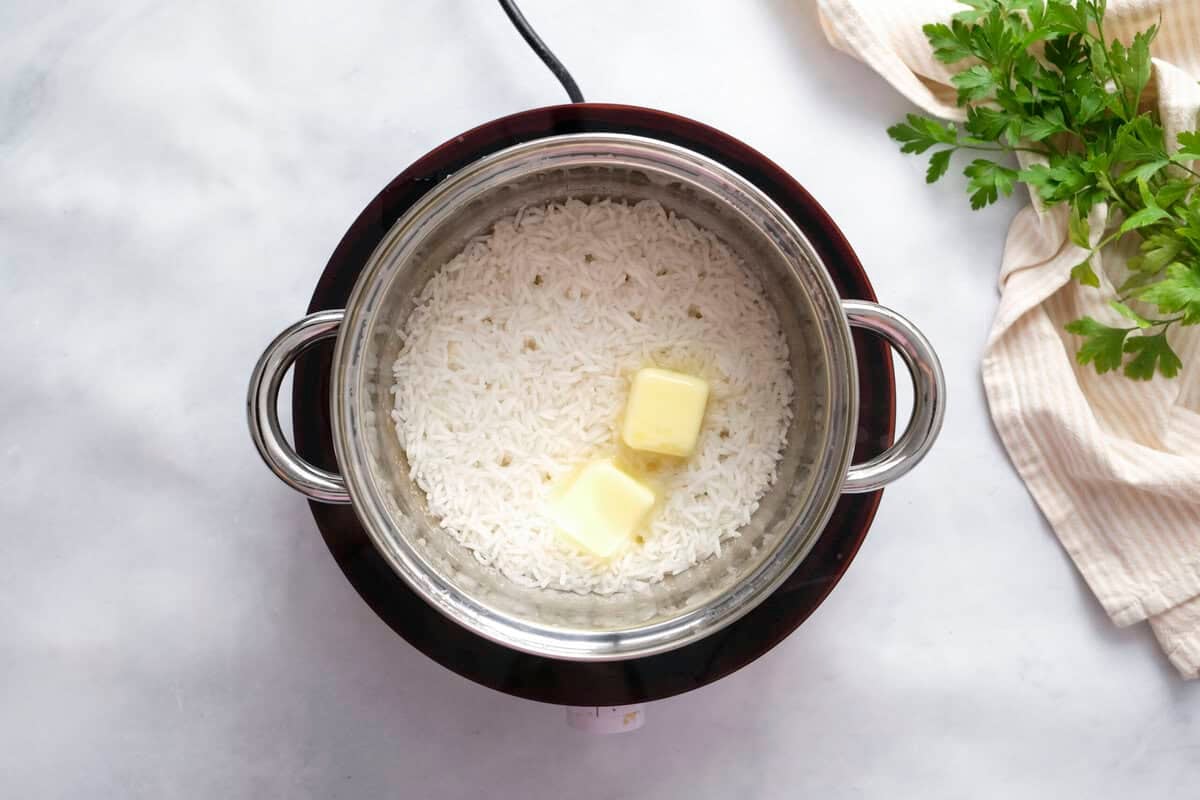 adding butter to the pot