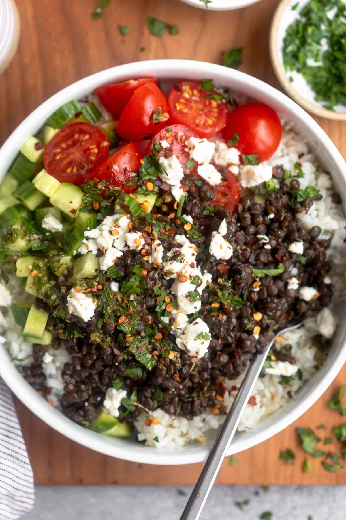 mediterranean lentil bowls with a fork on the side